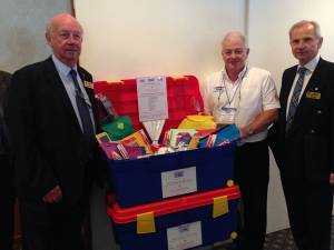 Ian Parker shows President Andrew one of the Literacy Boxes